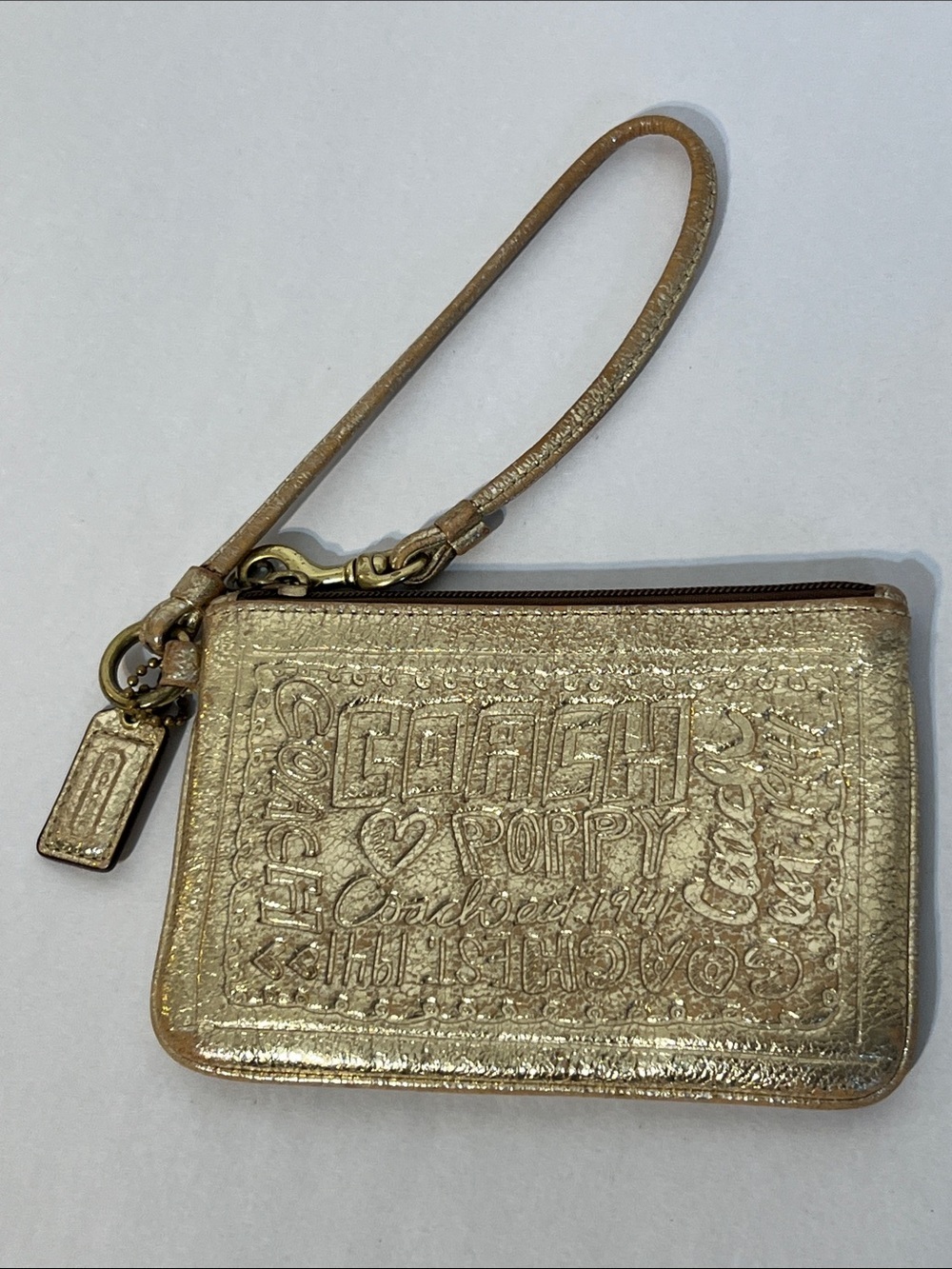 Coach Metallic Gold Embossed Poppy Wristlet